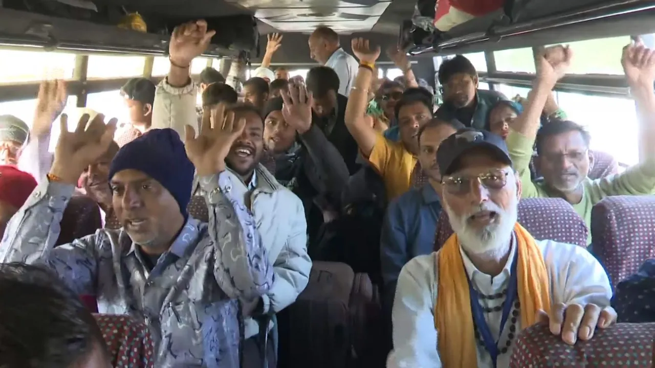 Pilgrims raise slogans as they leave for the holy cave shrine of Amarnath, in Srinagar, Saturday, July 20, 2024.
