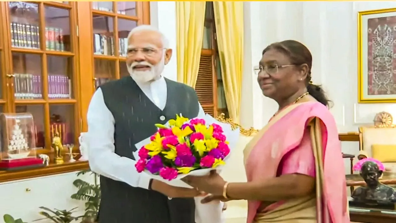 President Droupadi Murmu meets Prime Minister Narendra Modi at the Rashtrapati Bhavan ahead of government formation, in New Delhi, Friday, June 7, 2024.