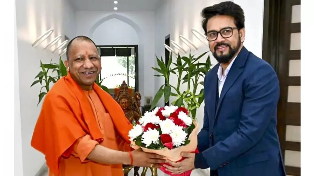 Union Minister Anurag Thakur and Uttar Pradesh Chief Minister Yogi Adityanath during a meeting, in Lucknow.