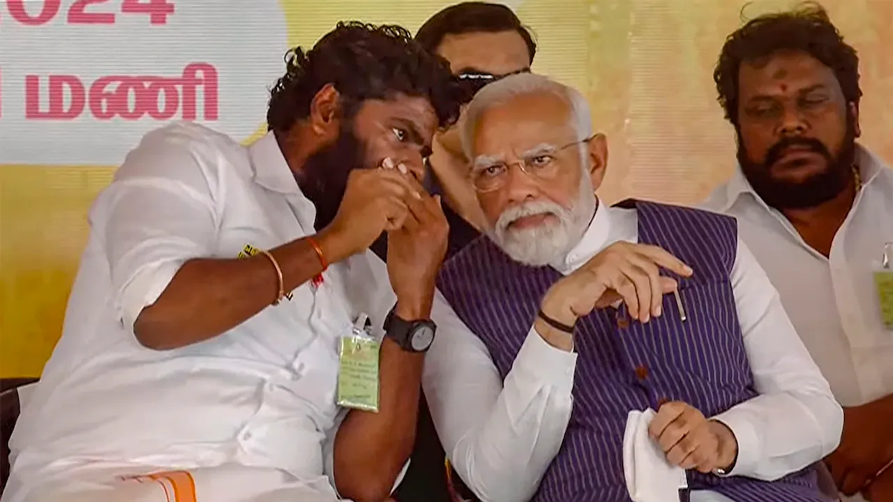 Narendra Modi with Tamil Nadu BJP chief K Annamalai during a public meeting, in Tirunelveli district, Wednesday, Feb. 28, 2024.