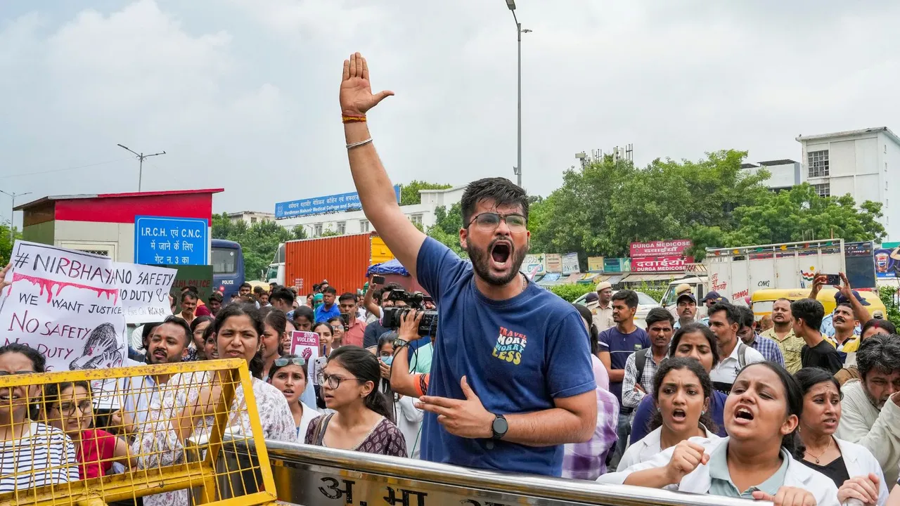 Doctors protest against the sexual assault and killing of a postgraduate trainee doctor in Kolkata, near AIIMS in New Delhi, Monday, Aug. 12, 2024.