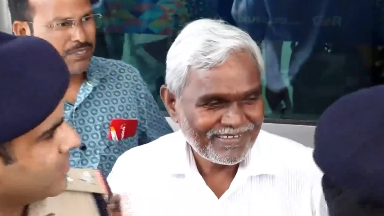 Former Jharkhand chief minister Champai Soren speaks with the media upon his arrival at Delhi airport, Sunday, Aug. 18, 2024.