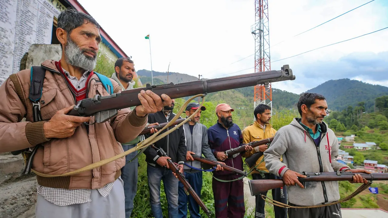 Village Defence Guards members stand guard after a VDG member Mohammad Sharif was killed while fighting terrorists in the Basantgarh area, in Udhampur district, Sunday, April 28, 2024