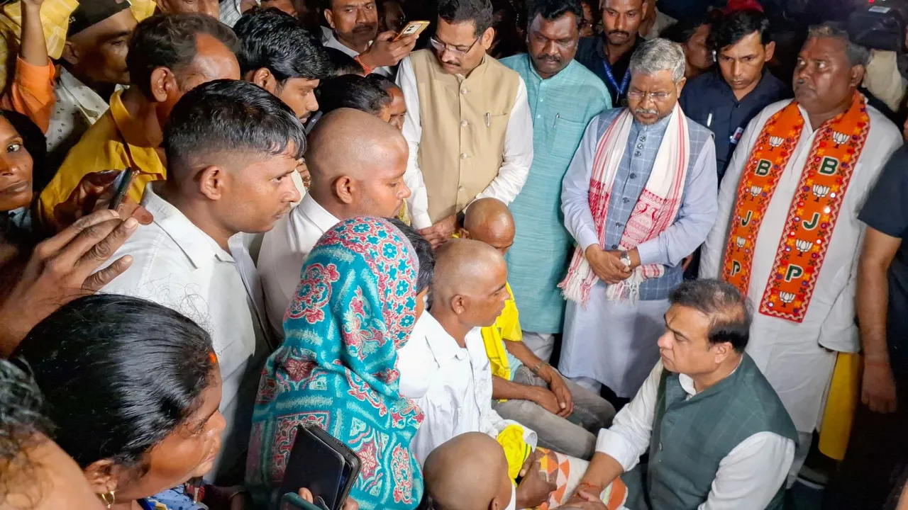 Assam Chief Minister Himanta Biswa Sarma meets family members of candidates who died during th excise constable recruitment rally, in Ranchi, Monday, Sept. 9, 2024.