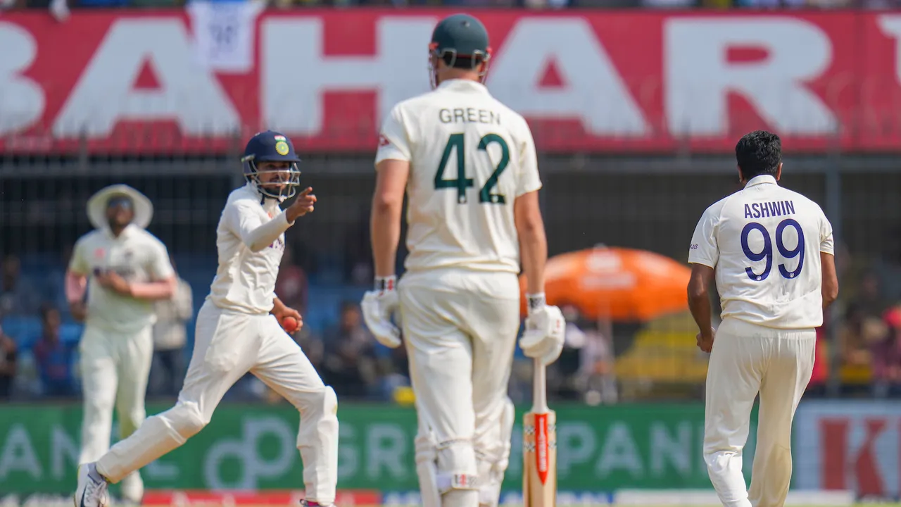 Indian cricketers Ravichandran Ashwin and Shreyas Iyer celebrate the wicket of Australian batter Peter Handscomb during the 2nd day of the 3rd test cricket match between India and Australia, at Holkar Cricket Stadium, in Indore, Thursday