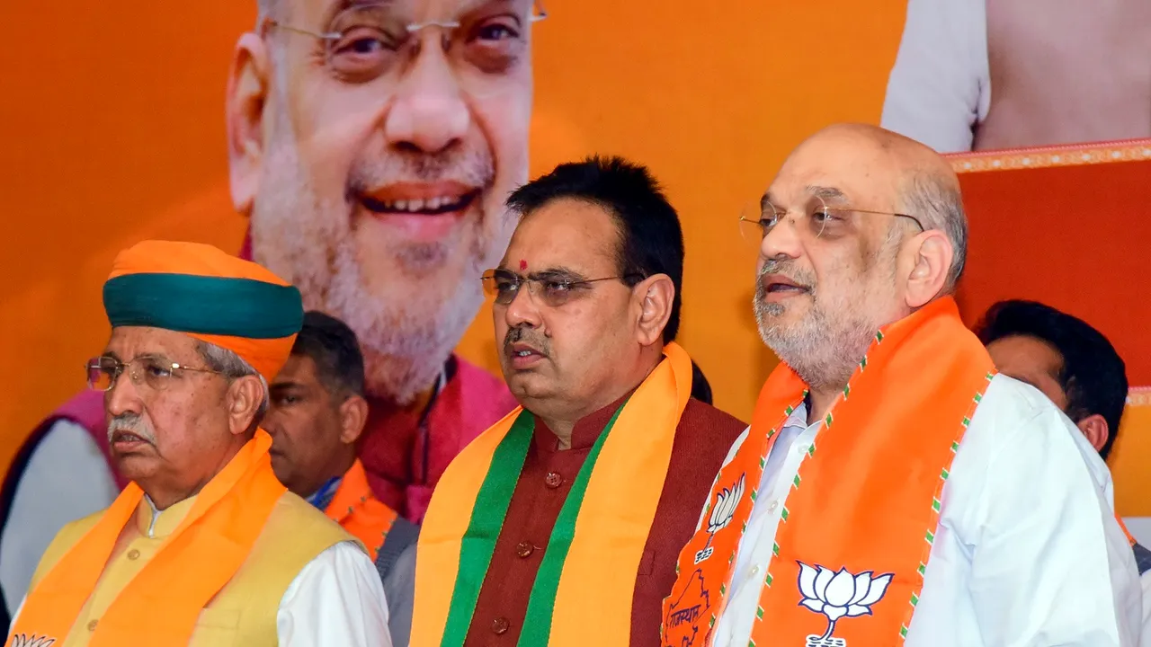 Union Home Minister Amit Shah with Union Minister for Law & Justice Arjun Ram Meghwal and Rajasthan Chief Minister Bhajanlal Sharma during a BJP meeting, in Bikaner