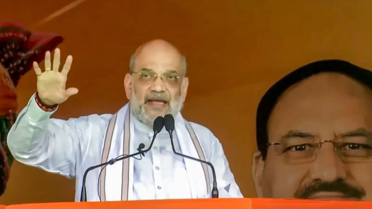 Union Minister and BJP leader Amit Shah addresses a rally in Naushera, Jammu and Kashmir, Sunday, Sept. 22, 2024.