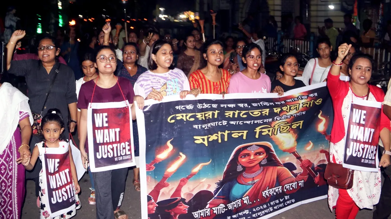Women march during a protest against the alleged rape and murder of a woman doctor at Kolkata's RG Kar Medical College and Hospital at Balurghat, in South Dinajpur district, Sunday, Aug. 18, 2024