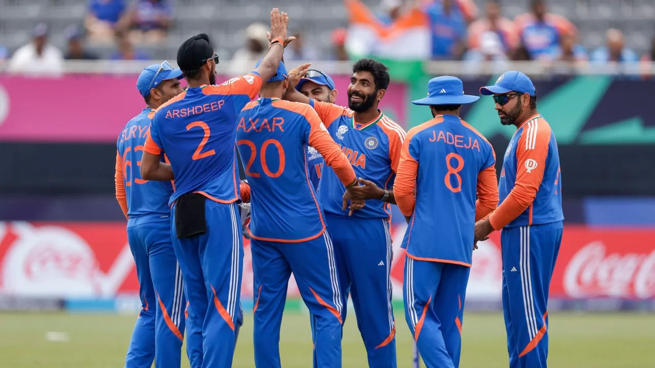 India's Jasprit Bumrah, third from right, is congratulated by teammates after taking the wicket of Ireland's Harry Tector during an ICC Men's T20 World Cup cricket match