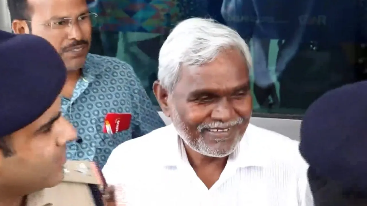 Former Jharkhand chief minister Champai Soren speaks with the media upon his arrival at Delhi airport, Sunday, Aug. 18, 2024.