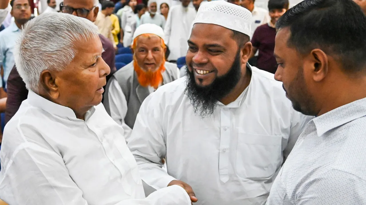 RJD chief Lalu Prasad Yadav being greeted by MLCs during during their swearing-in ceremony, in Patna, Tuesday, May 7, 2024