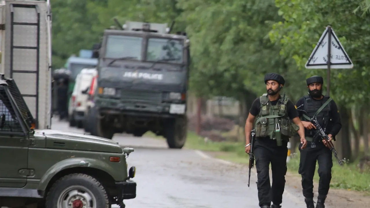 Security forces personnel during an encounter with militants, in Hadipora, Baramulla, Wednesday, June 19, 2024.