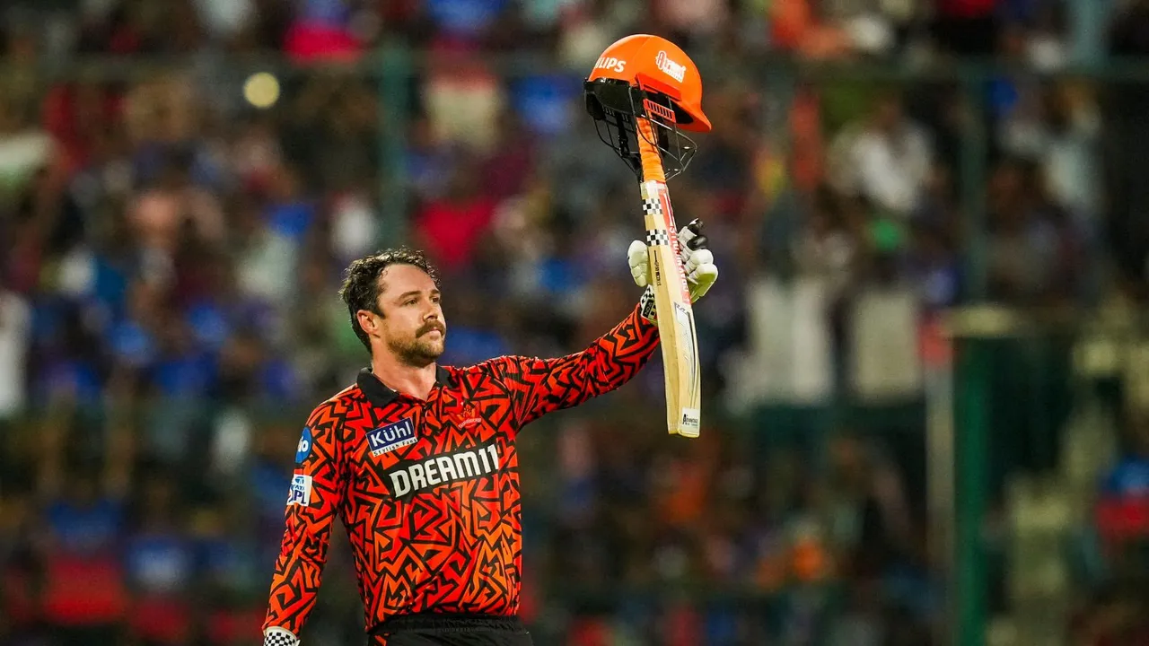 Sunrisers Hyderabad batter Travis Head celebrates his century during the Indian Premier League (IPL) 2024 cricket match