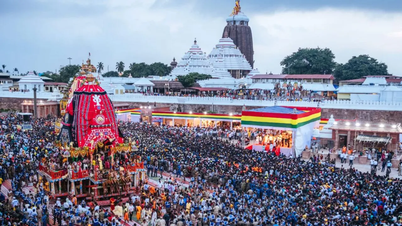 Devotees take part in the annual Rath Yatra, in Puri