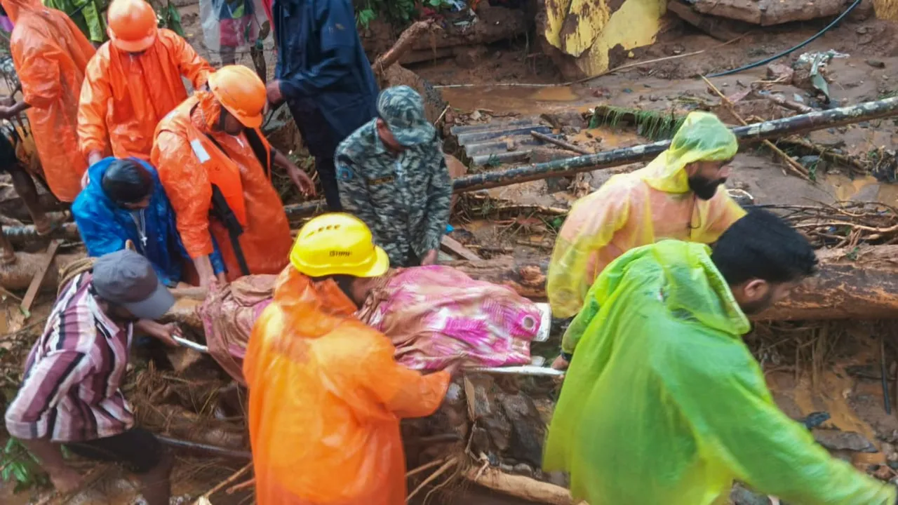 National Disaster Response Force (NDRF) personnel conduct rescue operation after landslides in the hilly areas near Meppadi, in Wayanad district, Kerala, Tuesday, July 30, 2024.