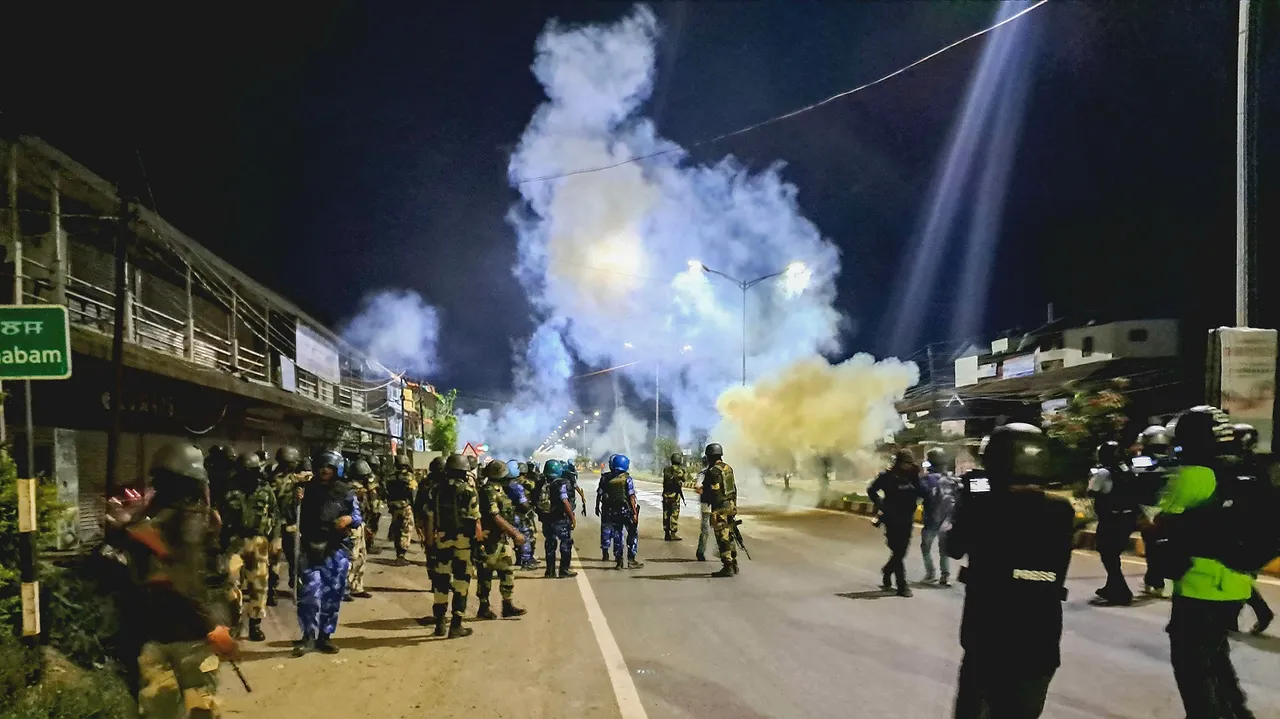 RAF and CRPF personnel guard after a mob tried to attack the ancestral house of Chief Minister N Biren Singh at Heingang in Imphal East district