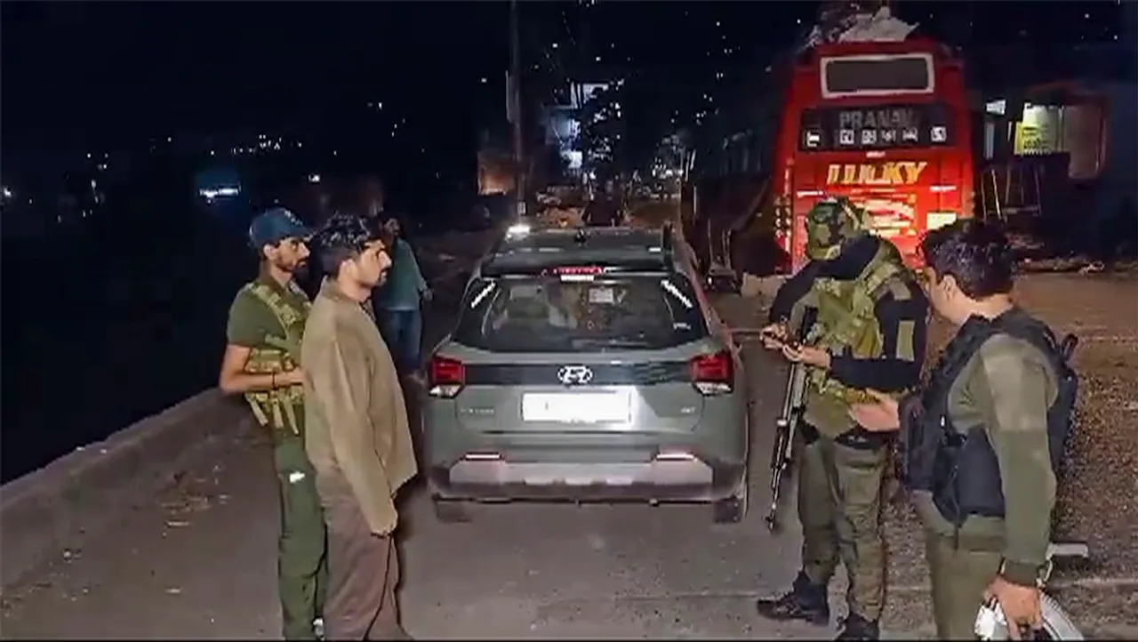 Security personnel stand guard after a terrorist attack on army vehicles, in Poonch district, Saturday, May 4, 2024.