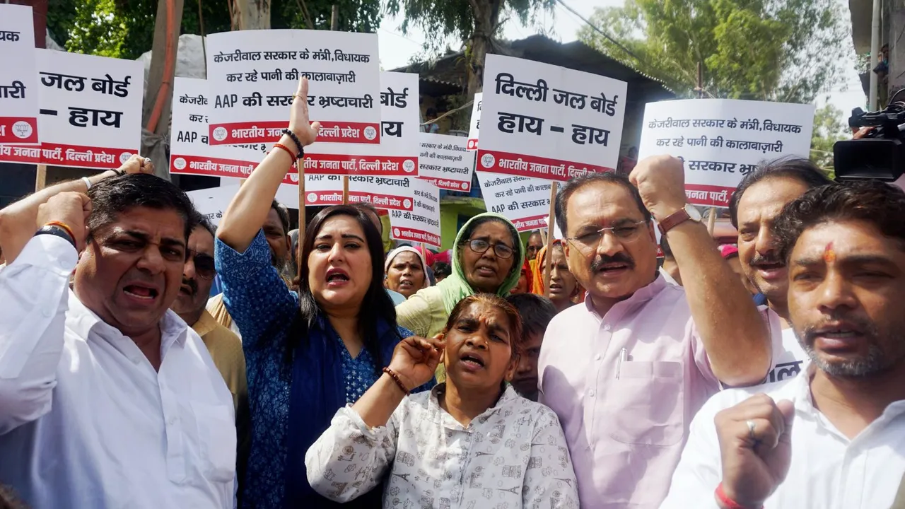BJP MP Bansuri Swaraj, Delhi party President Virendra Sachdeva with other party leaders and workers during a protest against the Delhi Jal Board over the ongoing water crisis in the national capital, in New Delhi, Wednesday, June 19, 2024.