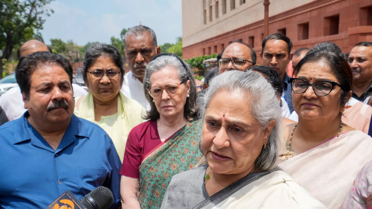 Samajwadi Party MP Jaya Bachchan speaks to the media as Congress MPs Sonia Gandhi, Rajeev Shukla and others look on during Monsoon session of Parliament, in New Delhi, Friday, Aug. 9, 2024.