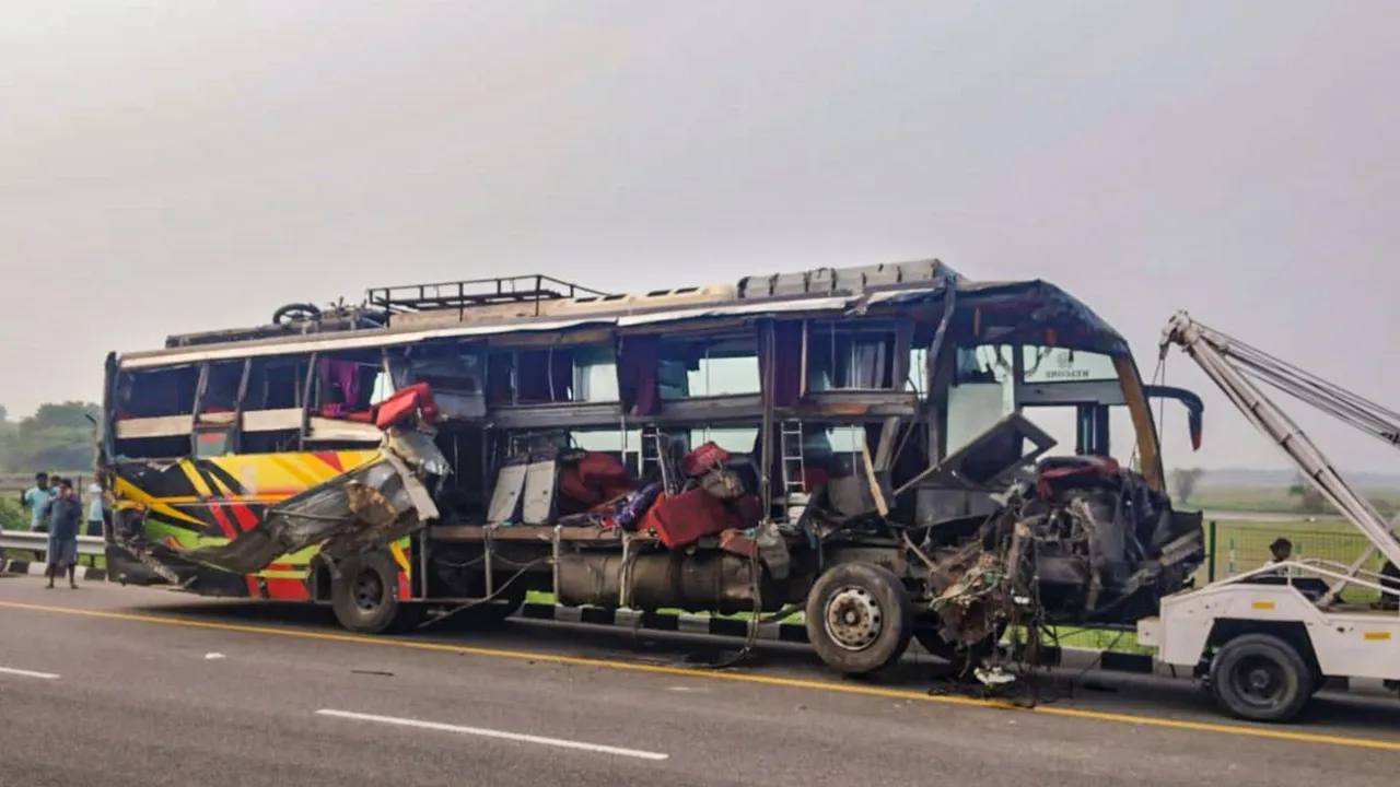 Mangled remains of a bus being towed after an accident, in Unnao district, Wednesday, July 10, 2024.