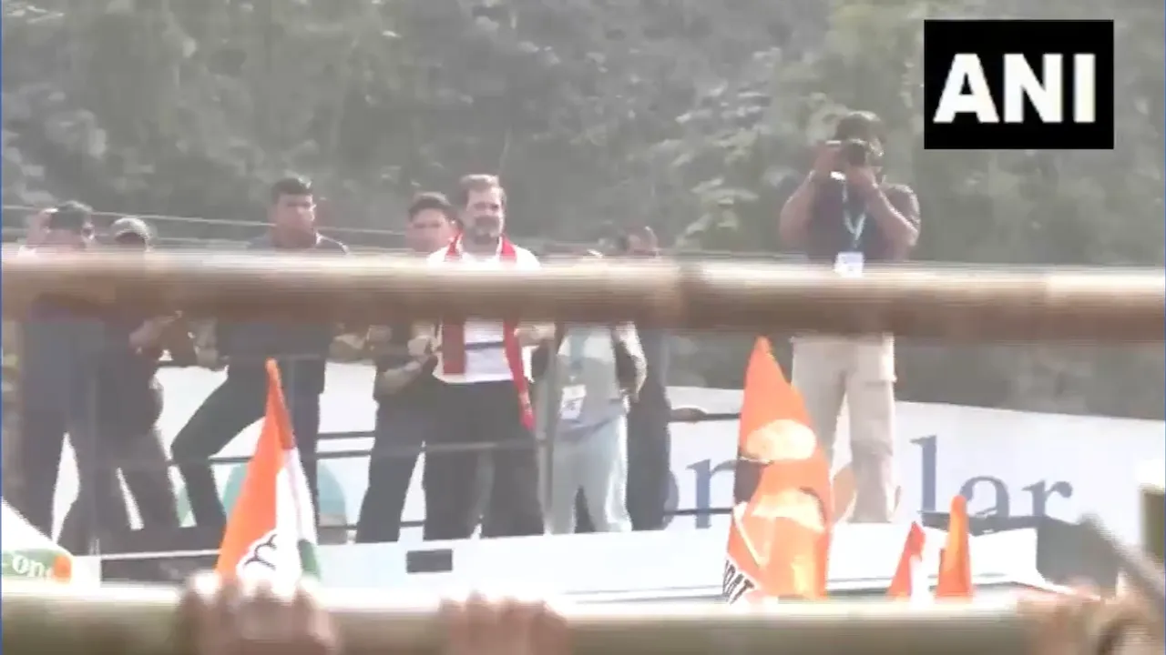 Rahul Gandhi watches as Congress workers break police barricades in Guwahati