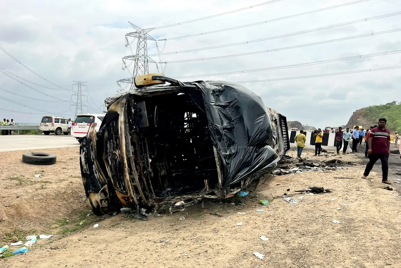 Charred remains of a bus that met with an accident and caught fire killing at least 25 passengers and injuring many others, in Buldhana district