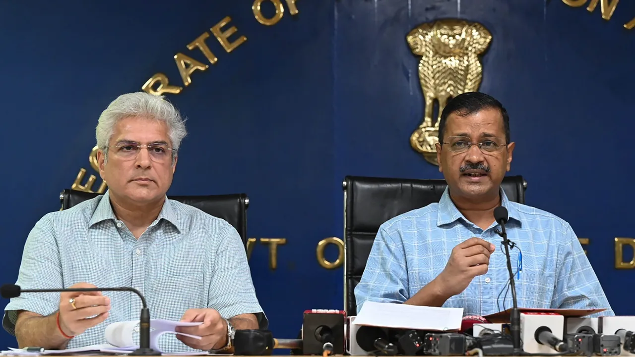 Delhi Chief Minister Arvind Kejriwal with Transport Minister Kailash Gahlot addresses a press conference, in New Delhi