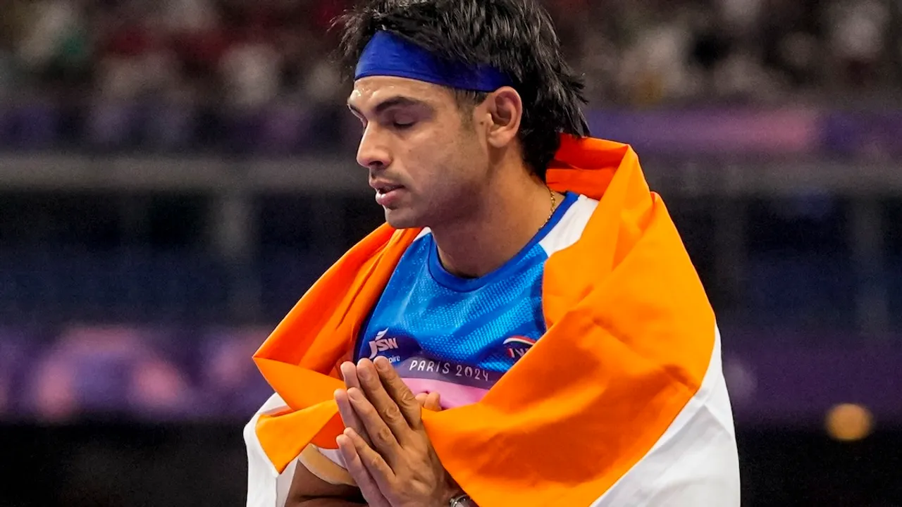 India's Neeraj Chopra after winning silver in the men's javelin throw final at the 2024 Summer Olympics, in Paris, France, Thursday, Aug. 8, 2024.