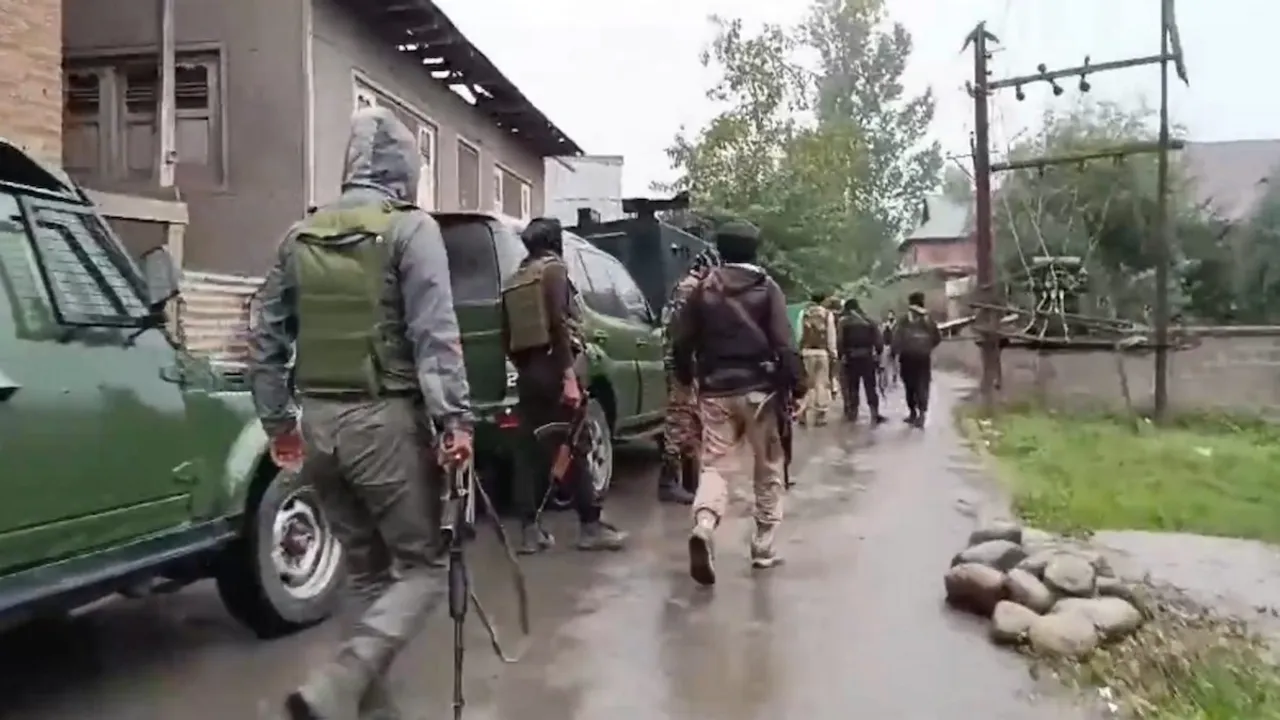 Security personnel during an encounter with militants at Adigam area, in Kulgam district, Jammu and Kashmir, Saturday, Sept. 28, 2024.