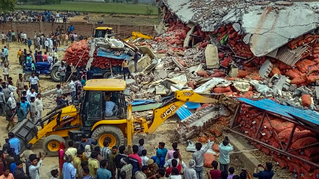 Rescue work underway after the roof of a cold storage collapsed in Chandausi area of Sambhal district in Uttar Pradesh