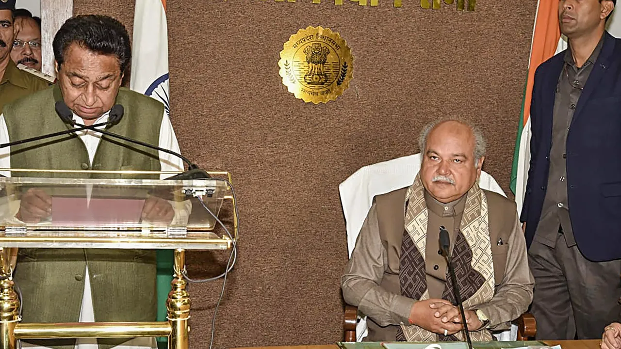 Madhya Pradesh Assembly Speaker Narendra Singh Tomar administers oath of office to newly elected MLA Kamal Nath