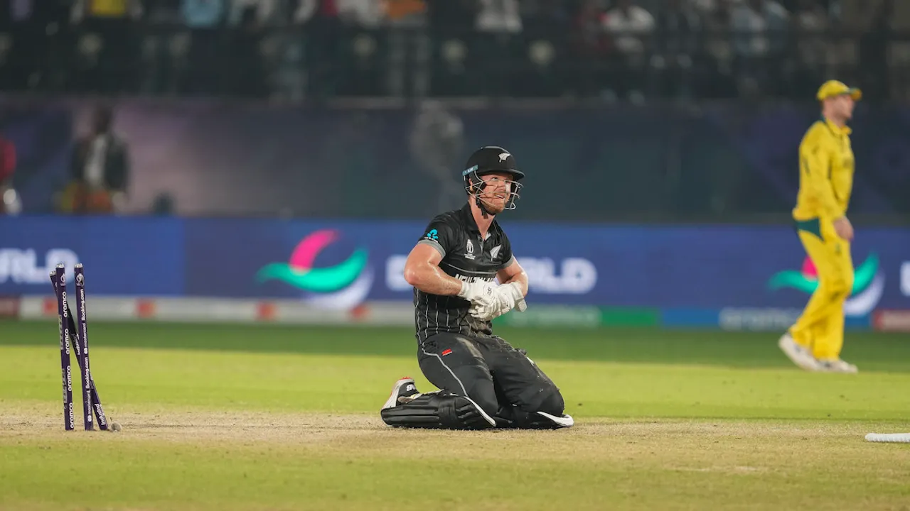New Zealand's J Neesham is run out during the ICC Men’s Cricket World Cup 2023 match between Australia and New Zealand, at HPCA Stadium, in Dharamshala, Saturday, Oct. 28, 2023.