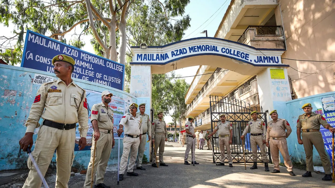 Security personnel stand guard outside a counting centre, a day before the counting of votes for Jammu & Kashmir Assembly elections, in Jammu, Monday, Oct. 7, 2024.