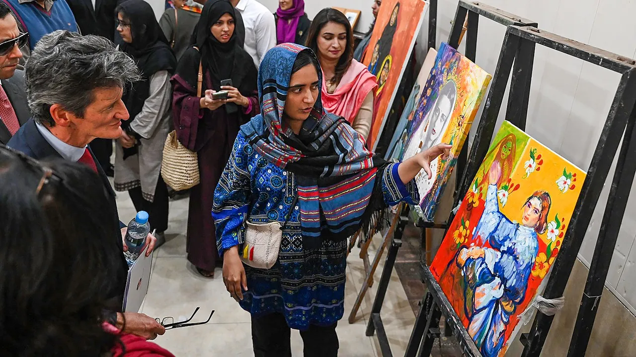 Visitors at an exhibition at the residence of Hungarian-Indian painter Amrita Sher-Gil, on the Mall Road, in Lahore