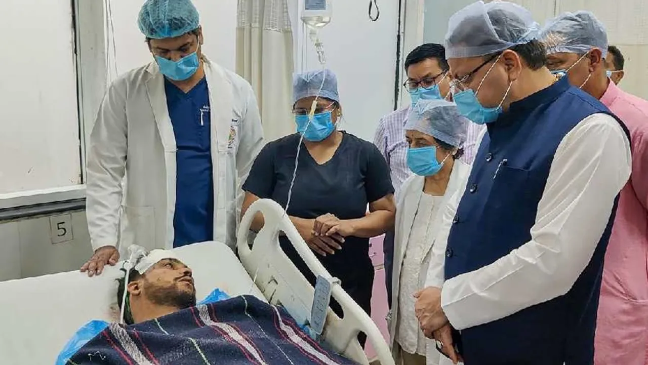 Uttarakhand Chief Minister Pushkar Singh Dhami meets people injured in the tempo traveller accident, in Rudraprayag