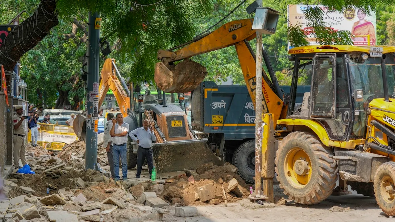 Excavators being used to demolish encroachments during a drive by MCD in Old Rajinder Nagar, after three civil services aspirants died at a coaching centre due to drowning, in New Delhi, Monday, July 29, 2024.