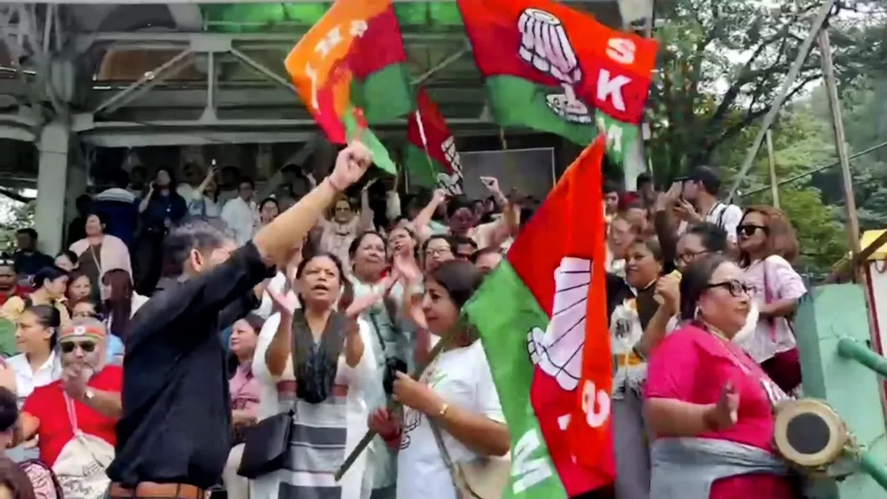 Sikkim Krantikari Morcha (SKM) members celebrate their lead in the Assembly polls, outside a counting centre, in Gangtok, Sunday, June 2, 2024