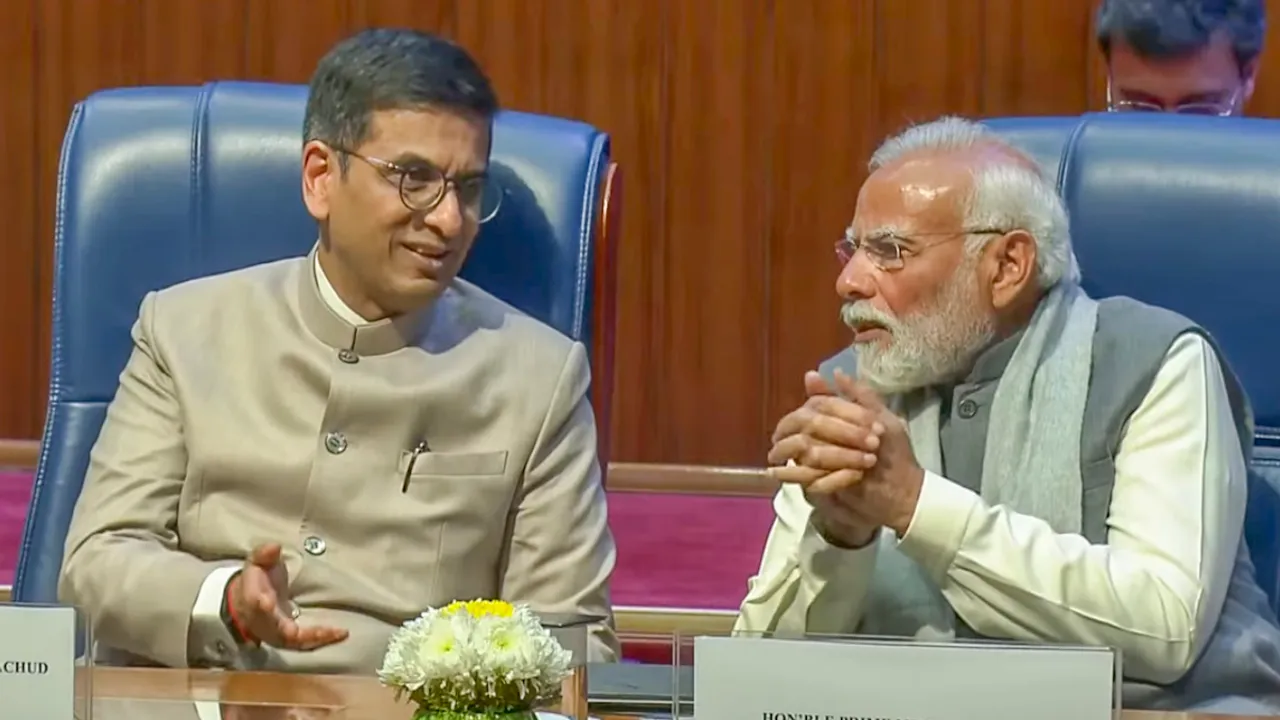 Prime Minister Narendra Modi and Chief Justice of India Justice D.Y. Chandrachud during the 75th year celebrations of the Supreme Court of India, in New Delhi, Sunday, Jan. 28, 2024.