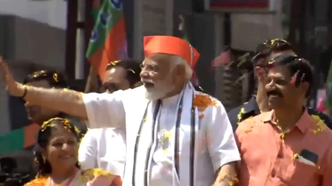 People in large numbers gathered to witness the roadshow of Prime Minister Narendra Modi in Palakkad