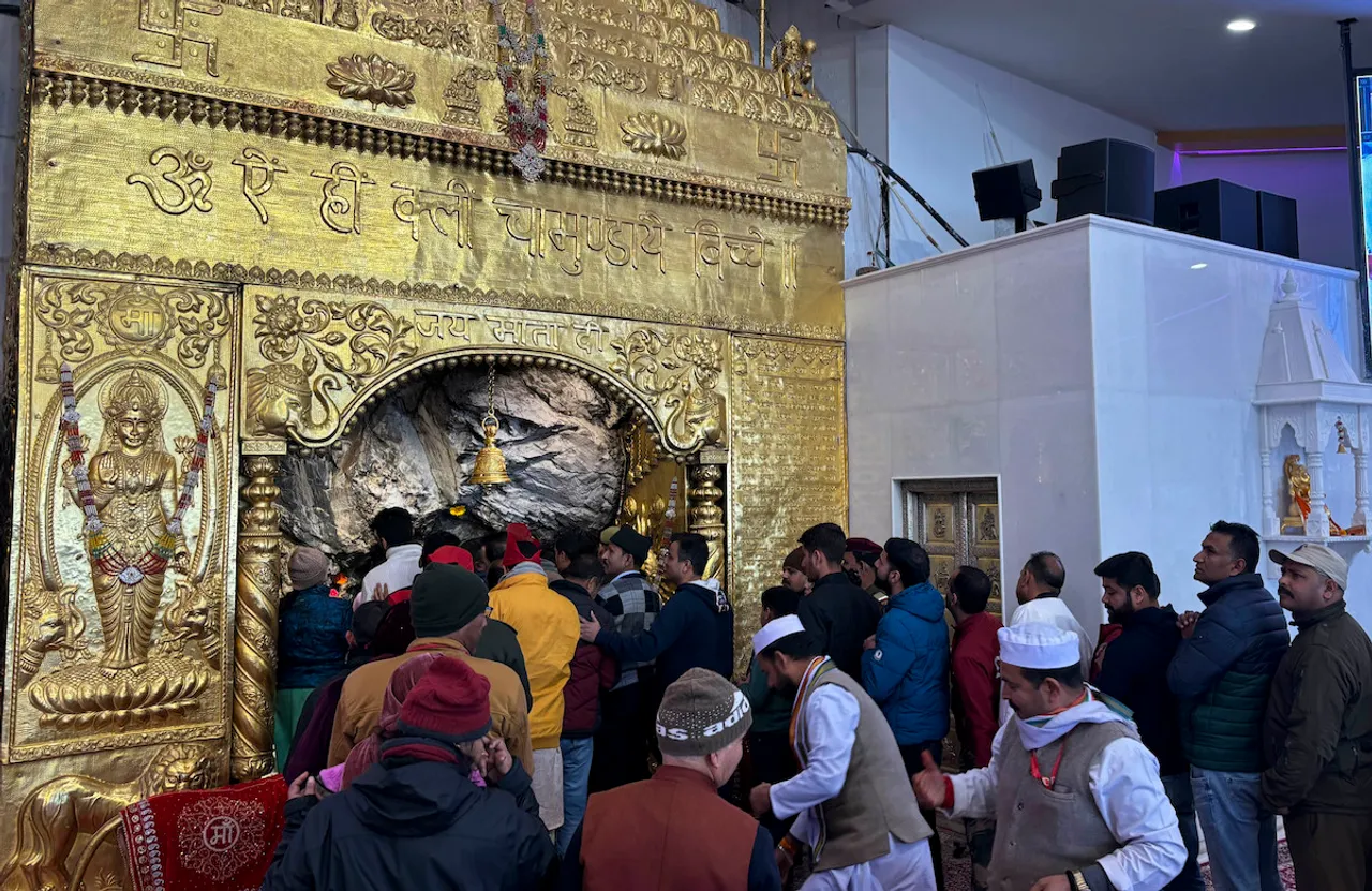 Devotees at the sacred ancient cave of Shri Mata Vaishno Devi Shrine after it opened, in Katra, Sunday, Jan. 14, 2024. 