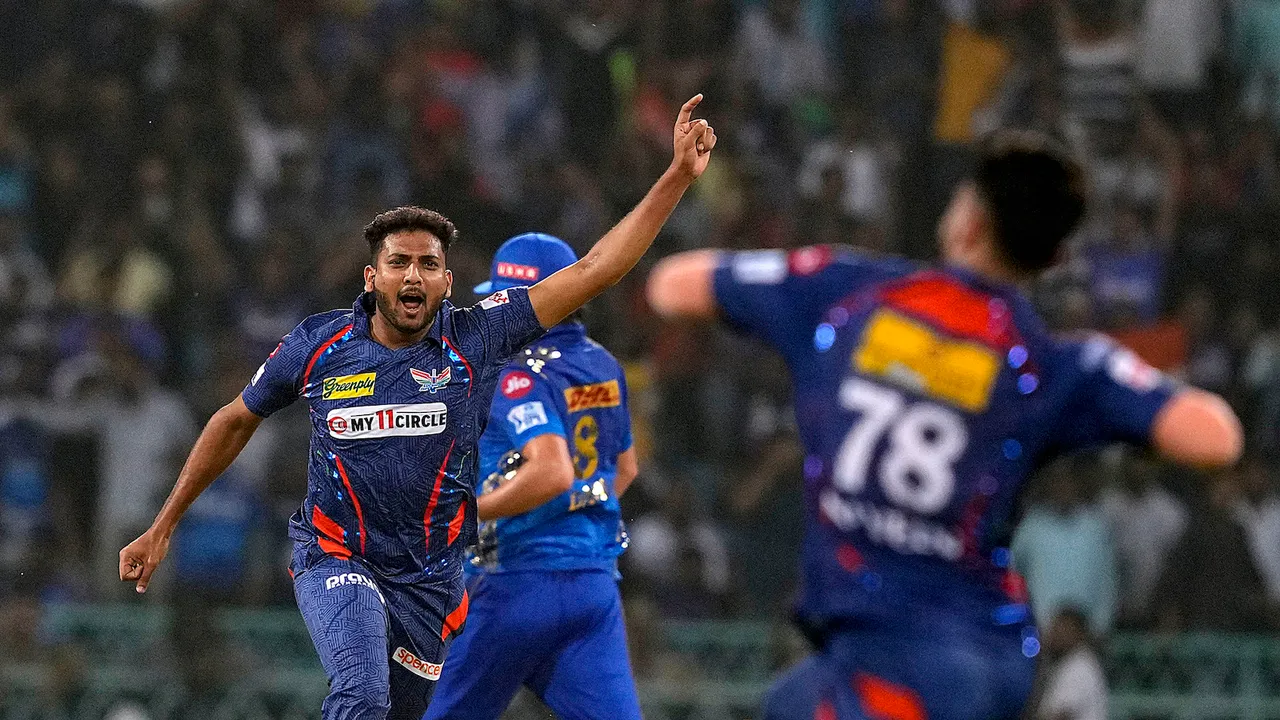 Lucknow Super Giants' Mohsin Khan celebrates after winning the IPL 2023 cricket match against Mumbai Indians at Atal Bihari Vajpayee Ekana Cricket Stadium in Lucknow on May 16