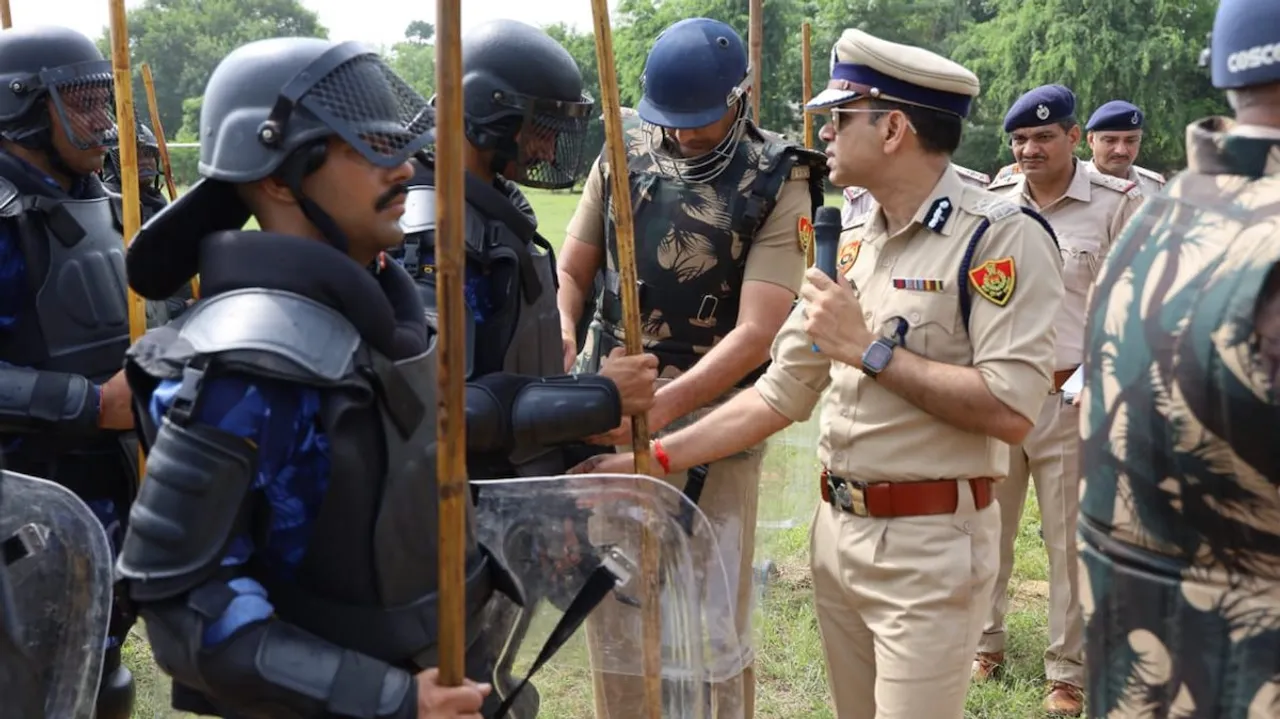  Faridabad Police Commissioner Rakesh Kumar Arya inspects during a 'riot control drill', in Faridabad, Saturday, Aug 26, 2023.