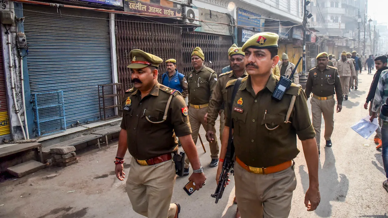 Security personnel conduct a flag march during 'Varanasi bandh' called by the Muslim community after a Varanasi court granted permission for puja in the 'Vyas ji ka Tehkhana' of the Gyanvapi Mosque, in Varanasi, Friday, Feb. 2, 2024.