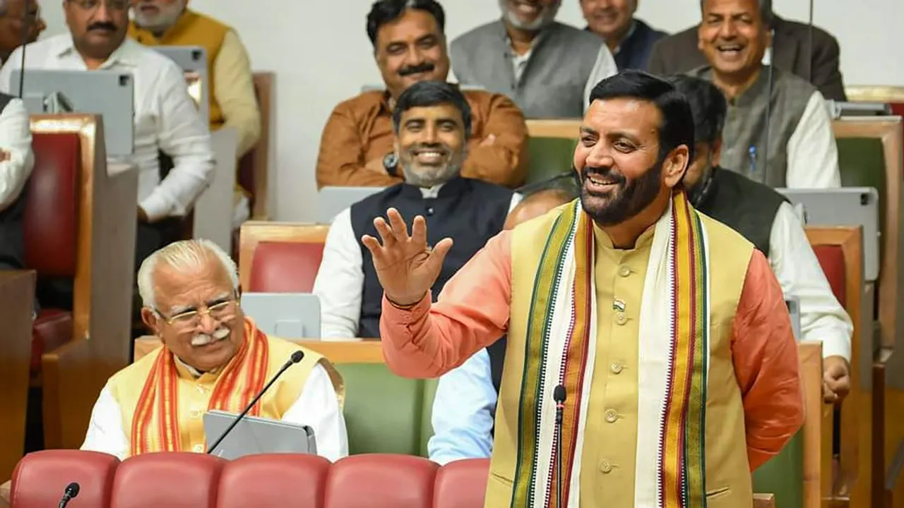 Haryana Chief Minister Nayab Singh Saini speaks as former CM Manohar Lal Khattar looks on during a special session of the state Assembly, in Chandigarh
