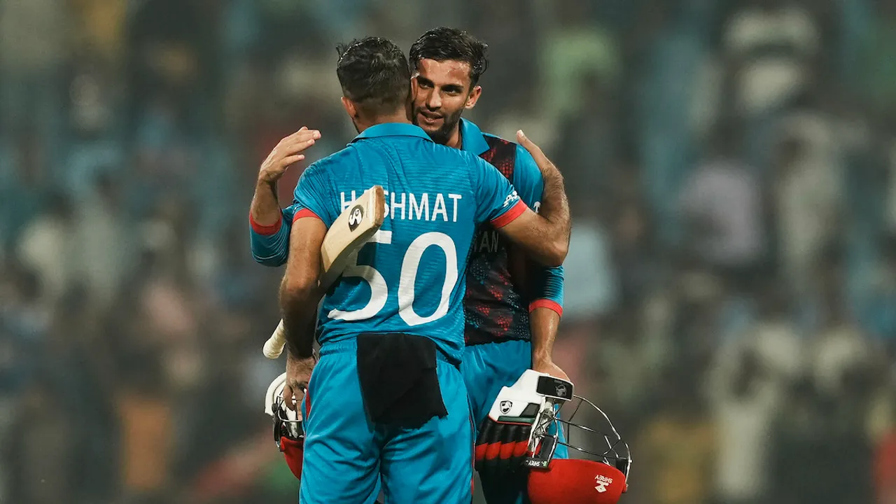 Afghanistan's batters Hashmatullah Shahidi and Azmatullah Omarzai celebrate after winning the ICC Men's Cricket World Cup 2023 match against Netherlands, at Bharat Ratna Shri Atal Bihari Vajpayee Ekana Cricket Stadium in Lucknow, Friday, Nov. 3, 2023.