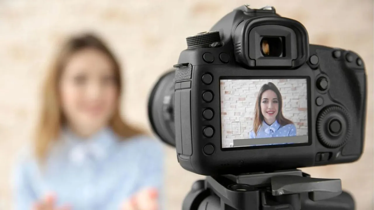 girl recording video for YouTube