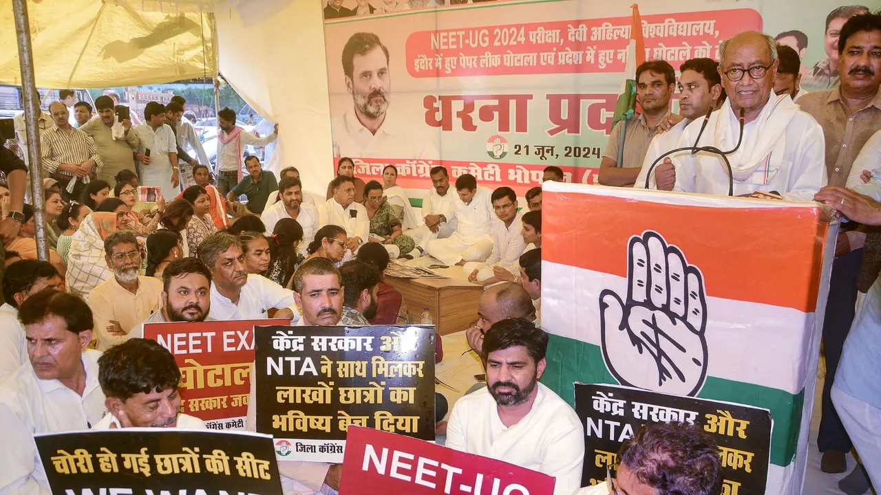Senior Congress leader and Rajya Sabha MP Digvijaya Singh addresses a party workers' dharna over the NEET-UG and UGC-NET issue, in Bhopal, Friday, June 21, 2024.