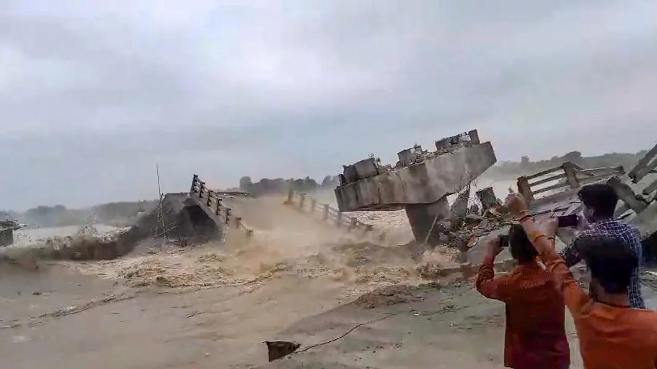 A bridge collapses into the Bakra river at Padkiya Ghat, in the Sikti block area of Araria, Bihar, Tuesday, June 18, 2024.