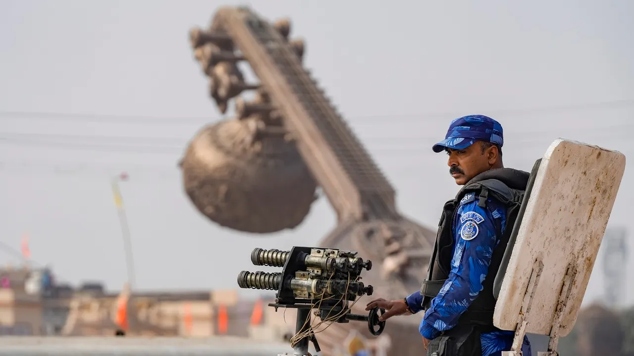 A Rapid Action Force (RAF) personnel keeps a watch at Lata Mangeshkar Chowk 