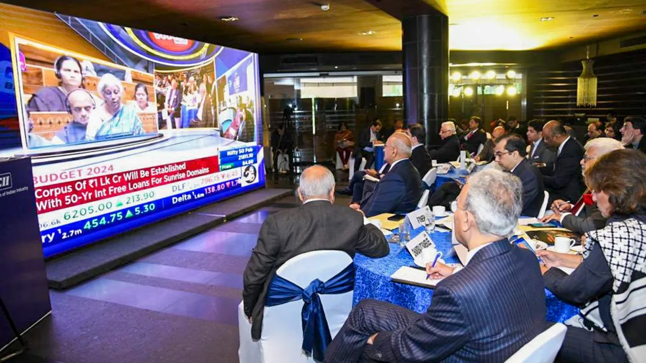 Business leaders watch the live telecast of the presentation of the Interim Budget 2024 by Union Finance Minister Nirmala Sitharaman, at the Confederation of Indian Industry (CII) headquarters, in New Delhi,